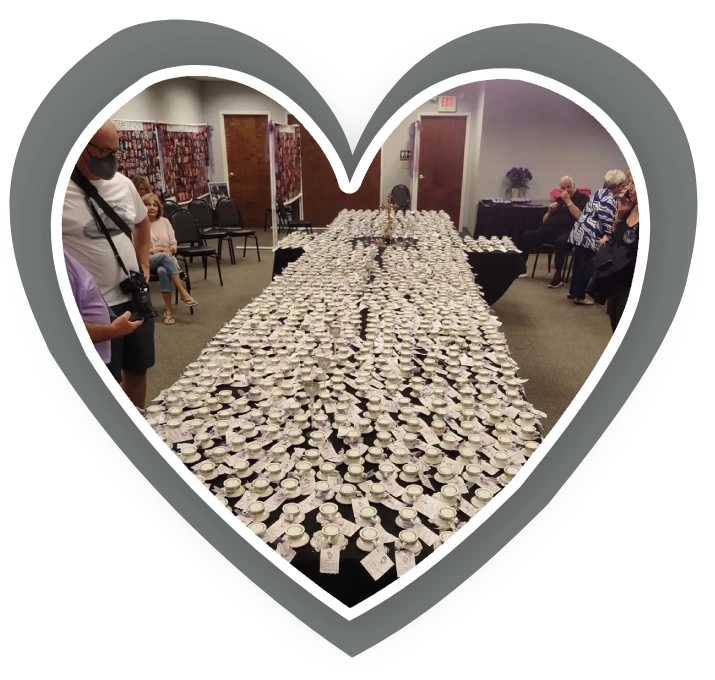 A large table covered in white napkins.